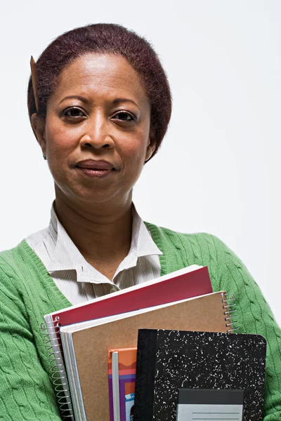 Porträt eines Lehrers mit Büchern — Stockfoto