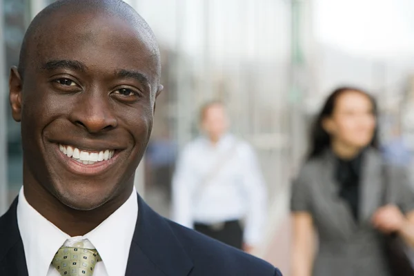 Businessman smiling to camera Stock Photo