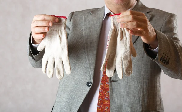 Gardening gloves in the hands of a man — Stock Photo, Image