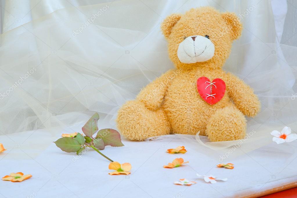 teddy bear with broken heart