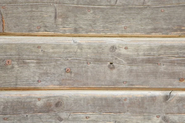 Eine Wand eines Holzhauses — Stockfoto