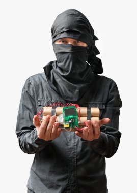 Terrorist holds dynamite bomb in hand. Isolated on white background. clipart