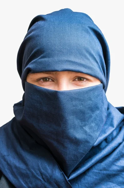 Head of young woman veiled with blue niqab scarf. Isolated on white background — Stock Photo, Image