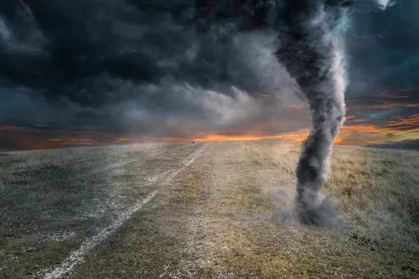 Black tornado funnel over field during thunderstorm — Stock Photo, Image