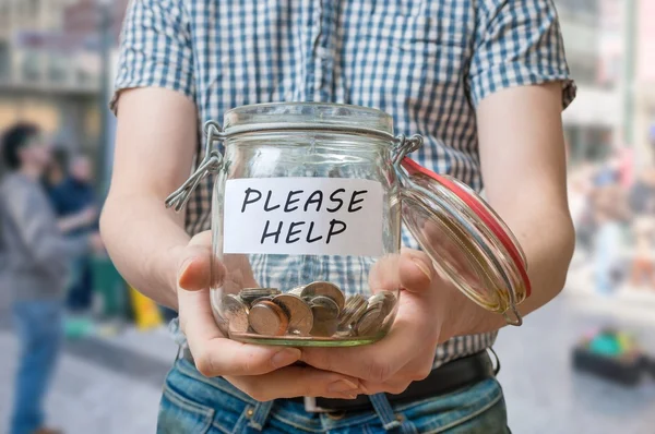 Man standing on street is asking for help. Man is begging for money — Stock Photo, Image