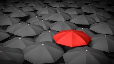 Liderlik ya da ayrım kavramı. Kırmızı şemsiye ve çevresinde birçok siyah şemsiye. 3D render illüstrasyon.