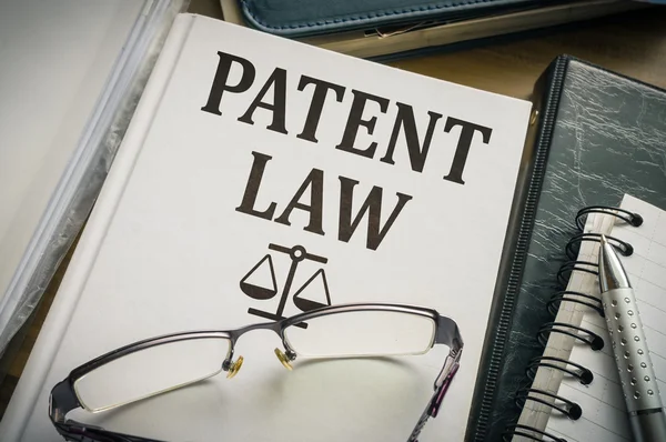 Patent law book. Justice and legislation concept. — Stock Photo, Image