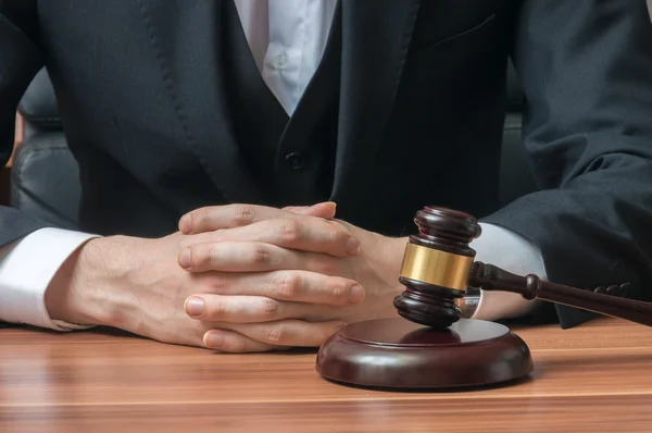 Law and justice concept. Judge or magistrate has clapsed hands. — Stock Photo, Image