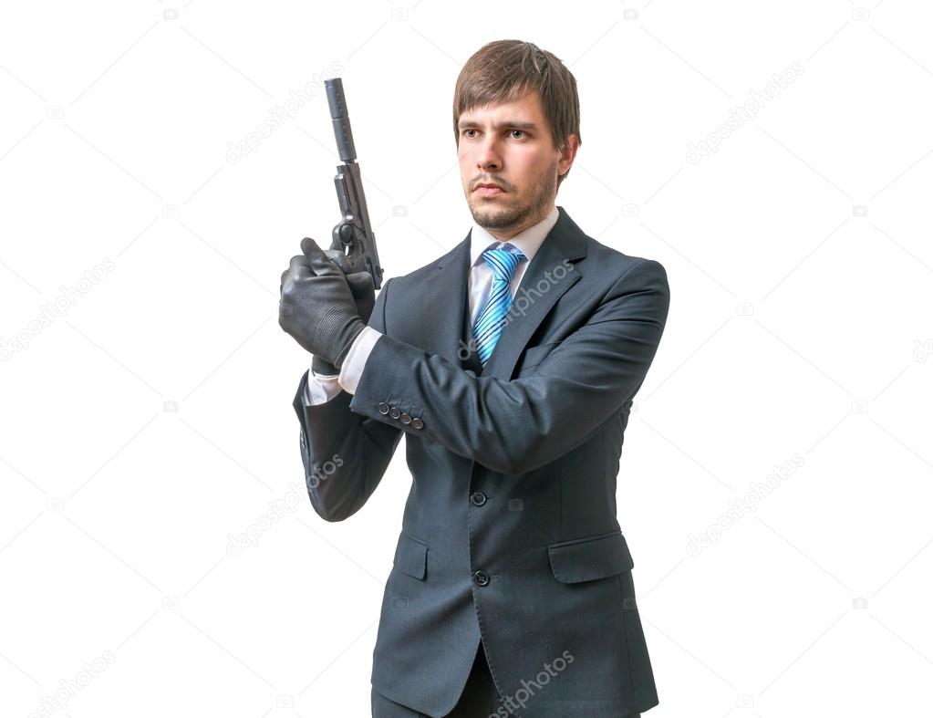 Bodyguard or agent with pistol in hands. Isolated on white background