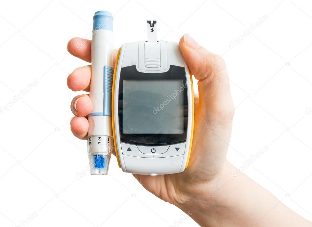 Diabetic patient holds glucometer and needle in hand. Isolated on white background.