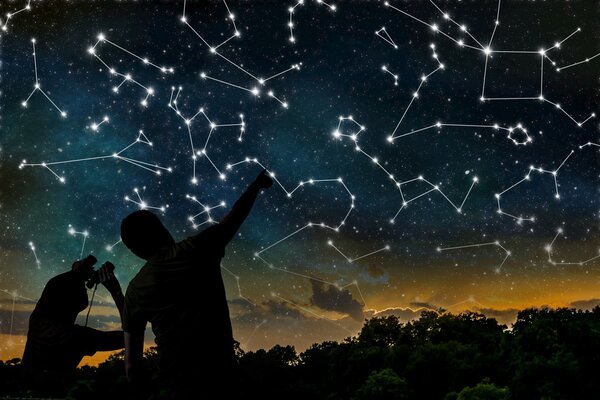 Astrology concept. Constellations on night sky. Silhouettes of a