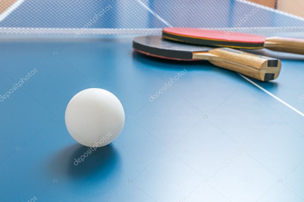 Table tennis player strikes bowling pins with ping-pong balls