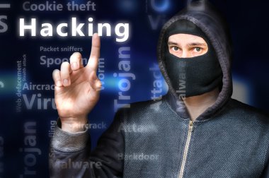 Maskeli anonim kesmek Hacking etiketinde işaret ediyor