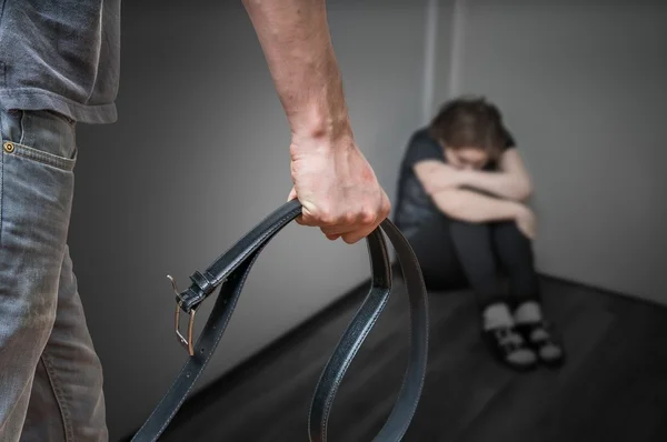 Domestic violence concept. Woman is abused by her angry husband. — Stock Photo, Image