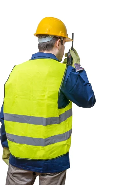 Ingegnere o lavoratore sta usando la radio. Isolato su sfondo bianco . — Foto Stock