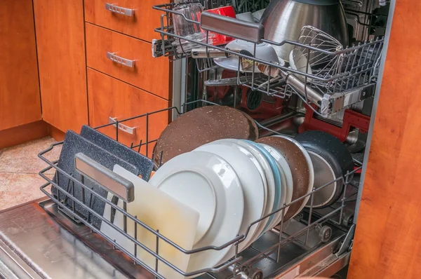 Dishwasher machine filled with dirty dishes. — Stock Photo, Image