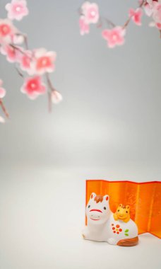 Kiraz çiçeği arkaplanı ve At Yılı materyali