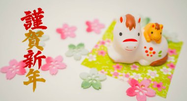 Kiraz çiçekleri ve at Mutlu Yıllar (At Yılı materyali))