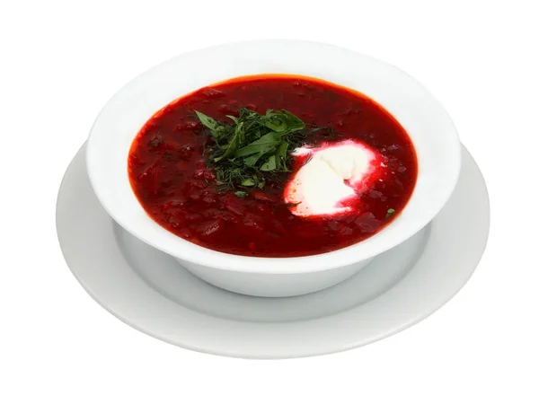 サワークリームとハーブとウクライナとロシアの国家赤のボルシュ 白い丸皿の上に赤ビートのスープのボウル — ストック写真