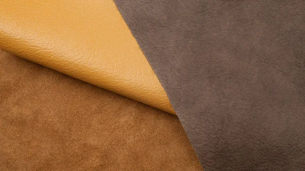 棕色背景下不同颜色的天然皮革纹理样本 — 图库照片
