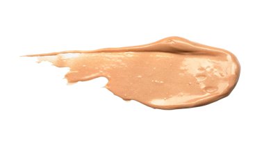 Beyaz arka planda kremalı bir temel var. İzole edilmiş. Güzellik ve moda anlayışı