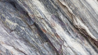 Benimkinde siyah beyaz mermer dokusu var. Maden kayalıkları engebeli yüzey. Arkaplan olarak kullanılacak şablon