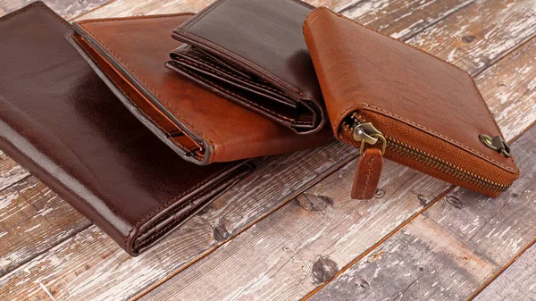 New Leather Multicolored Wallets Light Wooden Backgroun — Stock Photo, Image