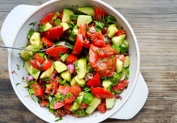 Tasty vegetarian salad with tomatoes and cucumber — Stock Photo, Image