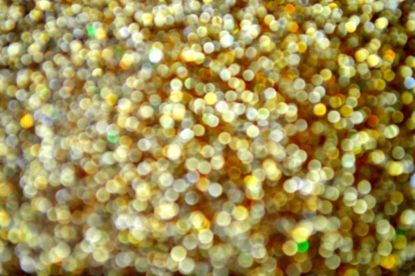 Bright and abstract blurred star golden background with shimmering glitter — Stock Photo, Image