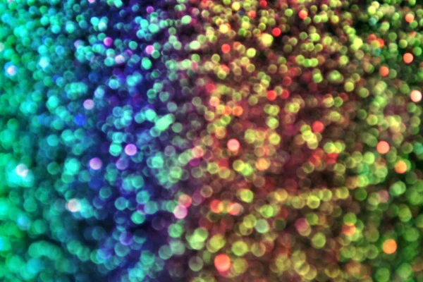 Parıldayan ile parlak ve soyut bulanık renkli gökkuşağı arka plan glitter