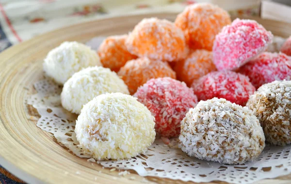 Caramelle al cocco arancioni, bianche e rosa — Foto Stock