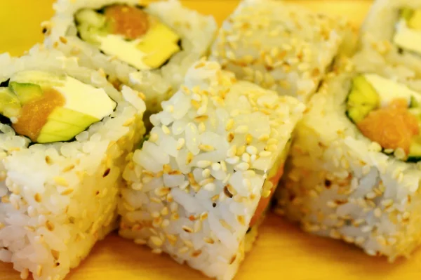 Delicious rolls and sushi with cucmber, salmon and philadelphia — Stock Photo, Image