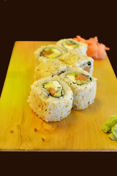 Delicious rolls and sushi with cucmber, salmon and philadelphia — Stock Photo, Image