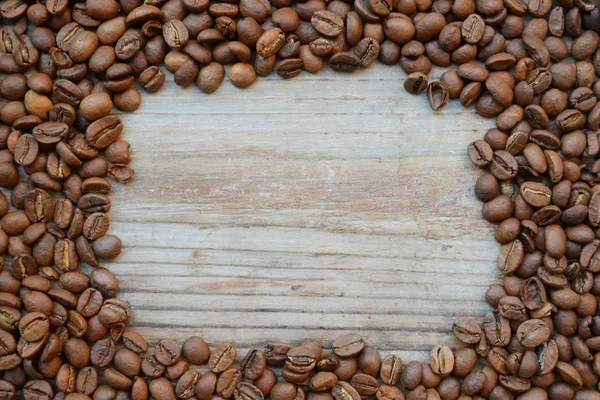 Frame made of lots of roasted coffee beans — Stock Photo, Image