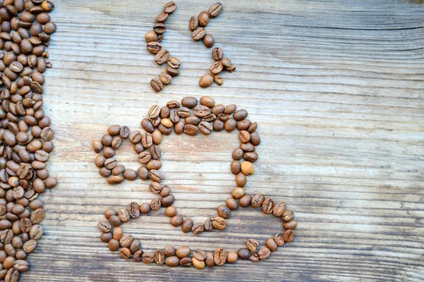 Taza o taza hecha de muchos granos de café tostados — Foto de Stock