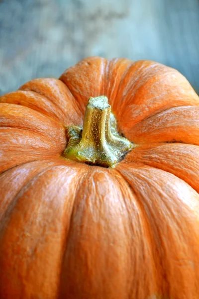 Orange pumpkin on wooden table — Stock Photo, Image