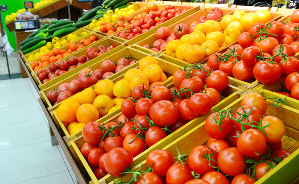 Different vegetables and fruit in grocery store