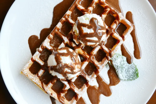 Belgian waffle with ice cream, chocolate and mint — Stock Photo, Image