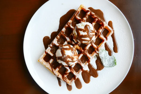 Belgian waffle with ice cream, chocolate and mint — Stock Photo, Image