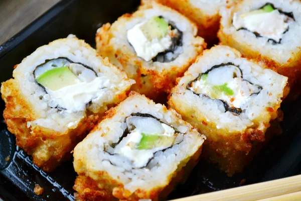 Delicious rolls and sushi with shrimp, cucumber and philadelphia — Stock Photo, Image