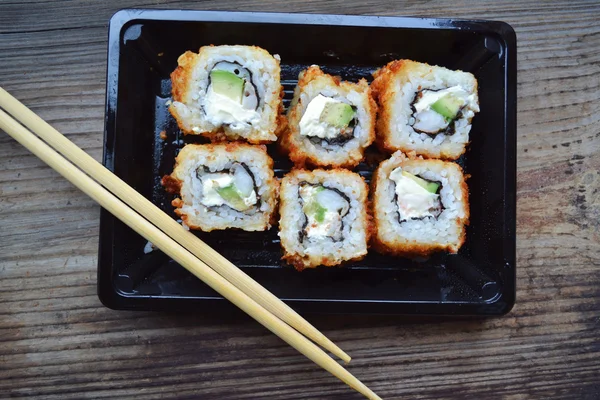 Delicious rolls and sushi with shrimp, cucumber and philadelphia — Stock Photo, Image