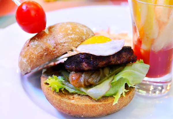 Cute mini burger with fried egg and cherry tomato — Stock Photo, Image