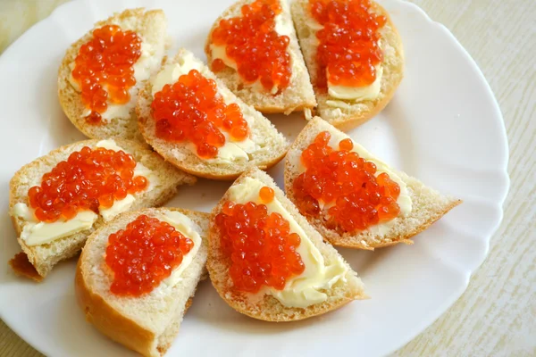 Canapes with red caviar — Stock Photo, Image