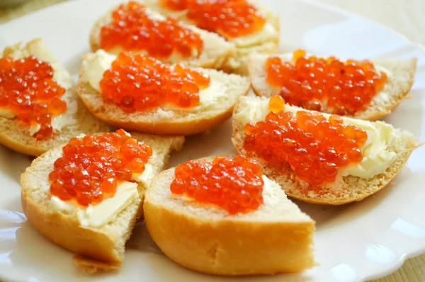 Canapes with red caviar — Stock Photo, Image