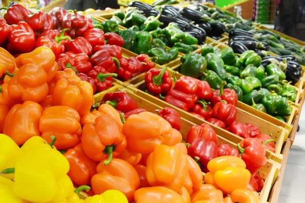 Sweet orange, yellow and red bell peppers — Stock Photo, Image
