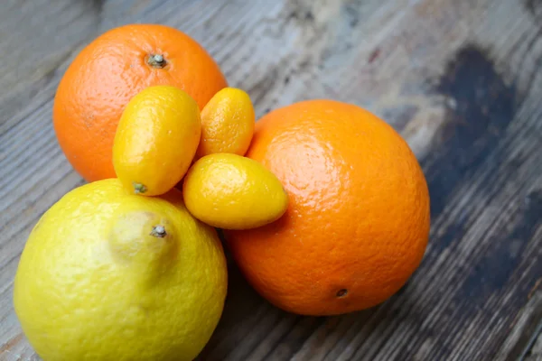 Set of citrus fruits from tangerines, kumquats, oranges and lemons — Stock Photo, Image