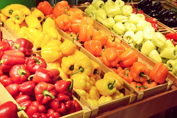 Sweet orange, yellow and red bell peppers — Stock Photo, Image