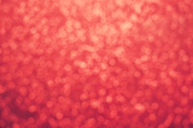 Parıldayan ile parlak ve soyut kırmızı arka plan bulanık glitter