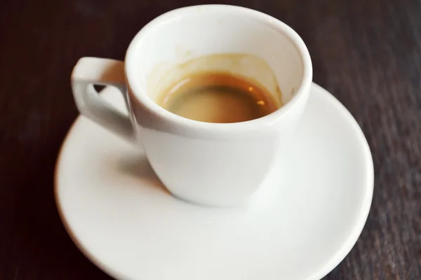 Small white cup of espresso coffee Royalty Free Stock Photos