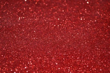 Parıldayan ile parlak ve soyut kırmızı arka plan bulanık glitter